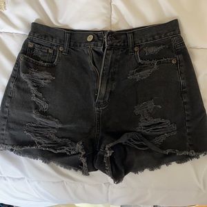 Distressed black jean shorts